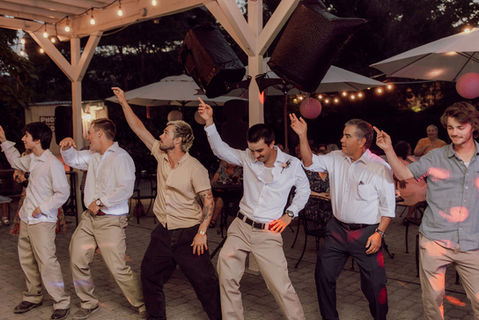 Wedding guests celebrating on the grounds